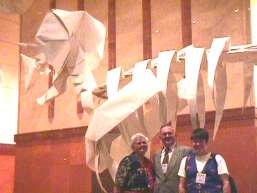 The McNitt family in front of the life sized Triceratops skeleton (created by Yoshino, folded by D-Team)
